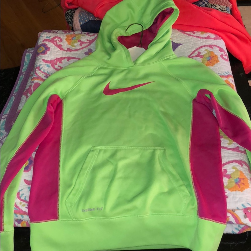 Kids size lime green Nike sweatshirt.